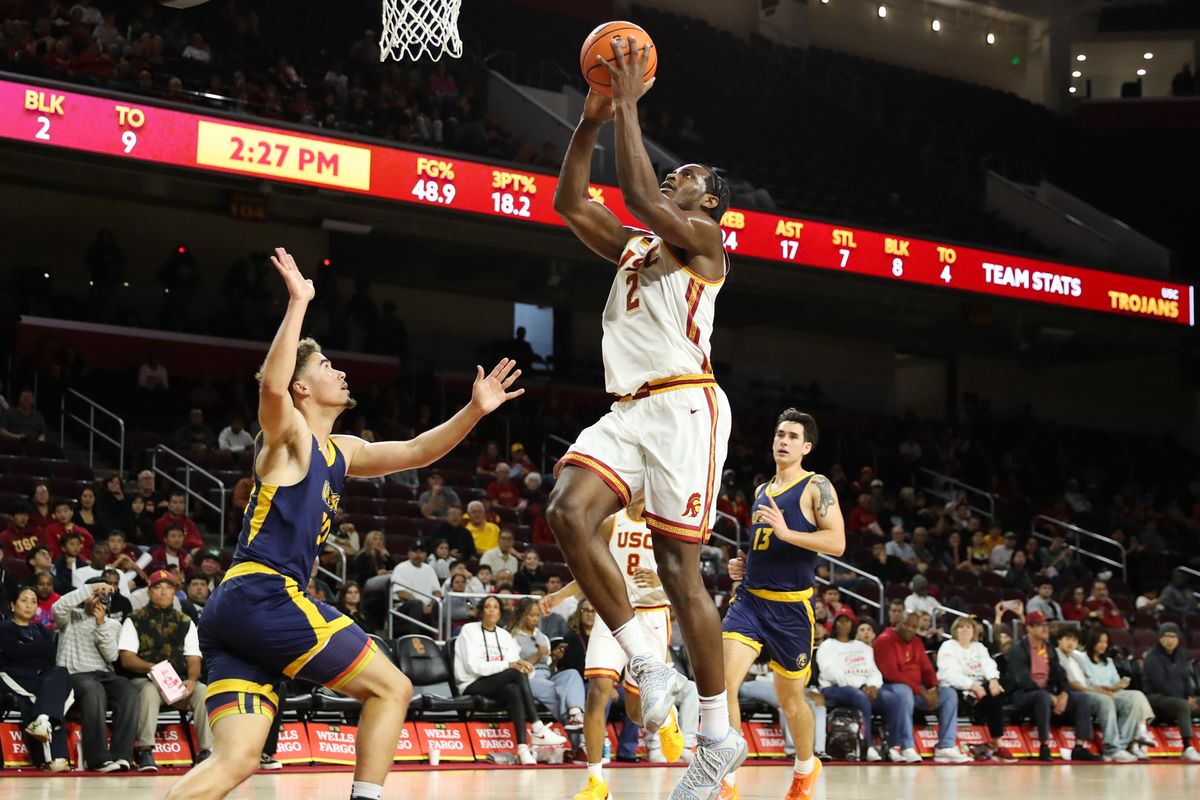 #2 F Ezra Ausar of USC attempts a layup during a NCAA basketball against UC Santa Cruz on December 21, 2025 in Los Angeles, CA.