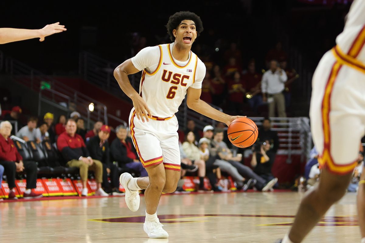 #6 F Jacob Cofie.of USC dribbles the ball during a NCAA basketball against UC Santa Cruz on December 21, 2025 in Los Angeles, CA.