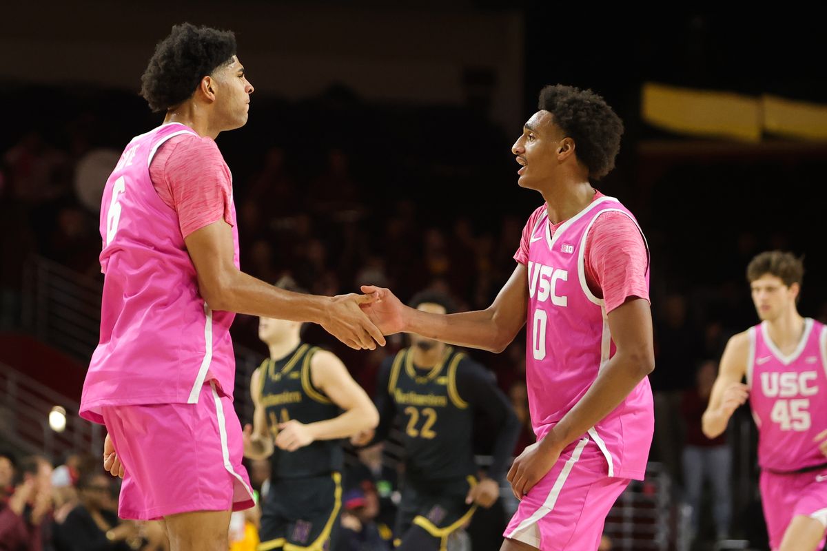 USC guard Alijah Arenas (0) celebrates a made basket with teammate USC forward Jacob Cofie (6) during an NCAA basketball game against Northwestern on January 21, 2026 in Los Angeles, CA.