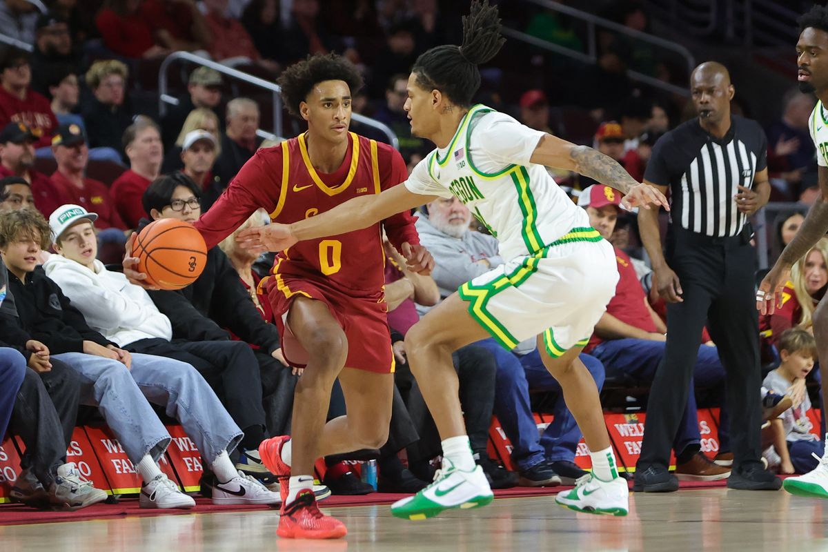USC guard Alijah Arenas (0) looks to pass during an NCAA basketball game against Oregon on February 21, 2026 in Los Angeles, CA. USC guard Alijah Arenas (0) looks to pass during an NCAA basketball game against Oregon on February 21, 2026 in Los Angeles, CA.