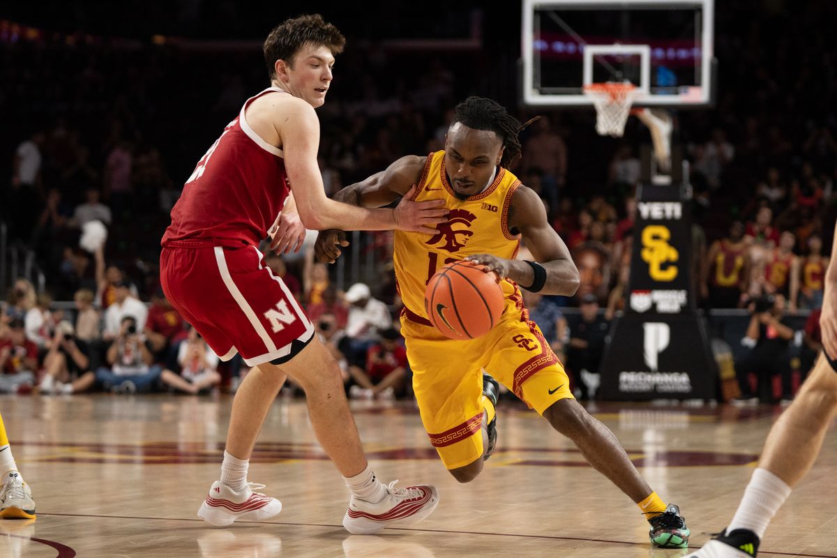 USC Trojans Guard Kam Woods (13) drives by his defender while getting grabbed during a men's college basketball game against the Nebraska Cornhuskers, Saturday February 28th, 2026 at Galen Center in Los Angeles, Calif. USC Trojans Guard Kam Woods (13) drives by his defender while getting grabbed during a men's college basketball game against the Nebraska Cornhuskers, Saturday February 28th, 2026 at Galen Center in Los Angeles, Calif.