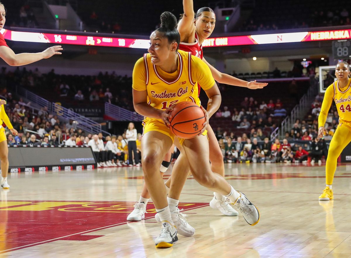USC G (12) JuJu Watkins attacks the basket against the Nebraska Cornhuskers on January 1, 2025 at the Galen Center in Los Angeles, CA.