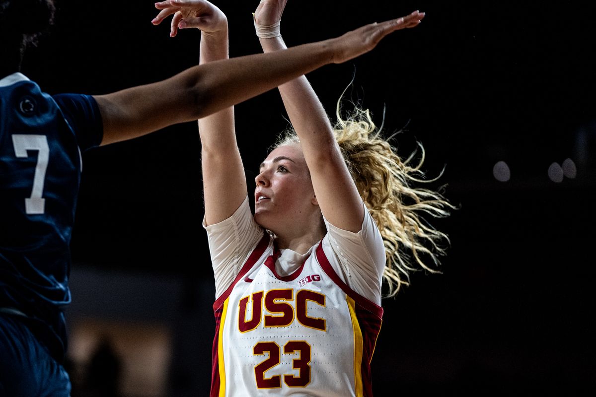 USC G Avery Howell (23) shoots over the defender in a game against Penn State, Sunday January 12, 2025 in Los Angeles, Calif.
