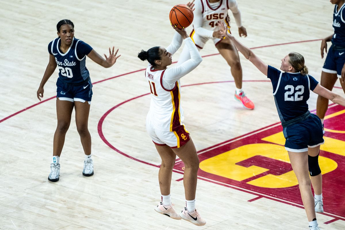 USC G Kennedy Smith (11) pulls up for two points in a game against Penn State, Sunday January 12, 2025 in Los Angeles, Calif.