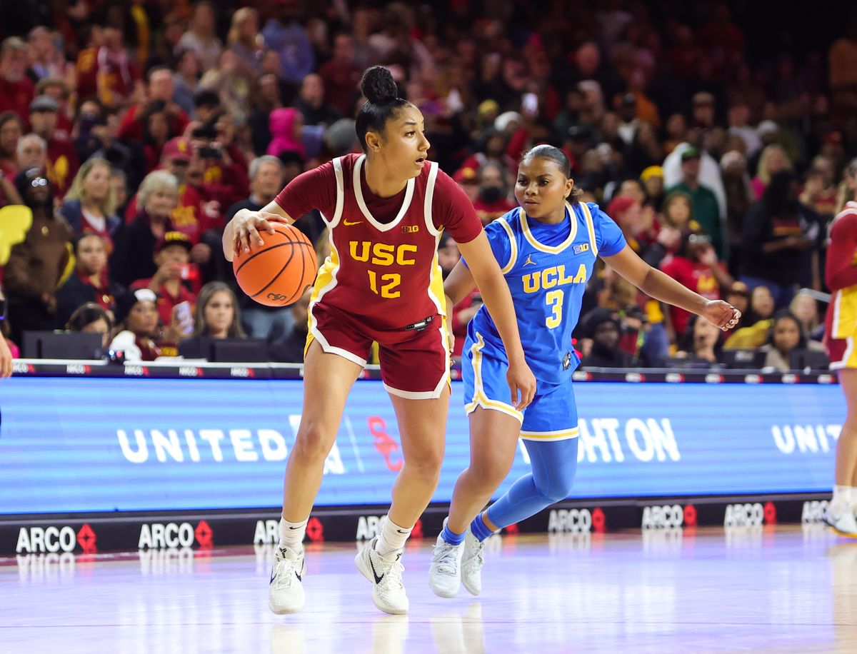 USC G (12) JuJu Watkins attempts to dribble past UCLA G (3) Londynn Jones on February 13, 2025 at the Galen Center in Los Angeles, CA. USC G (12) JuJu Watkins attempts to dribble past UCLA G (3) Londynn Jones on February 13, 2025 at the Galen Center in Los Angeles, CA.