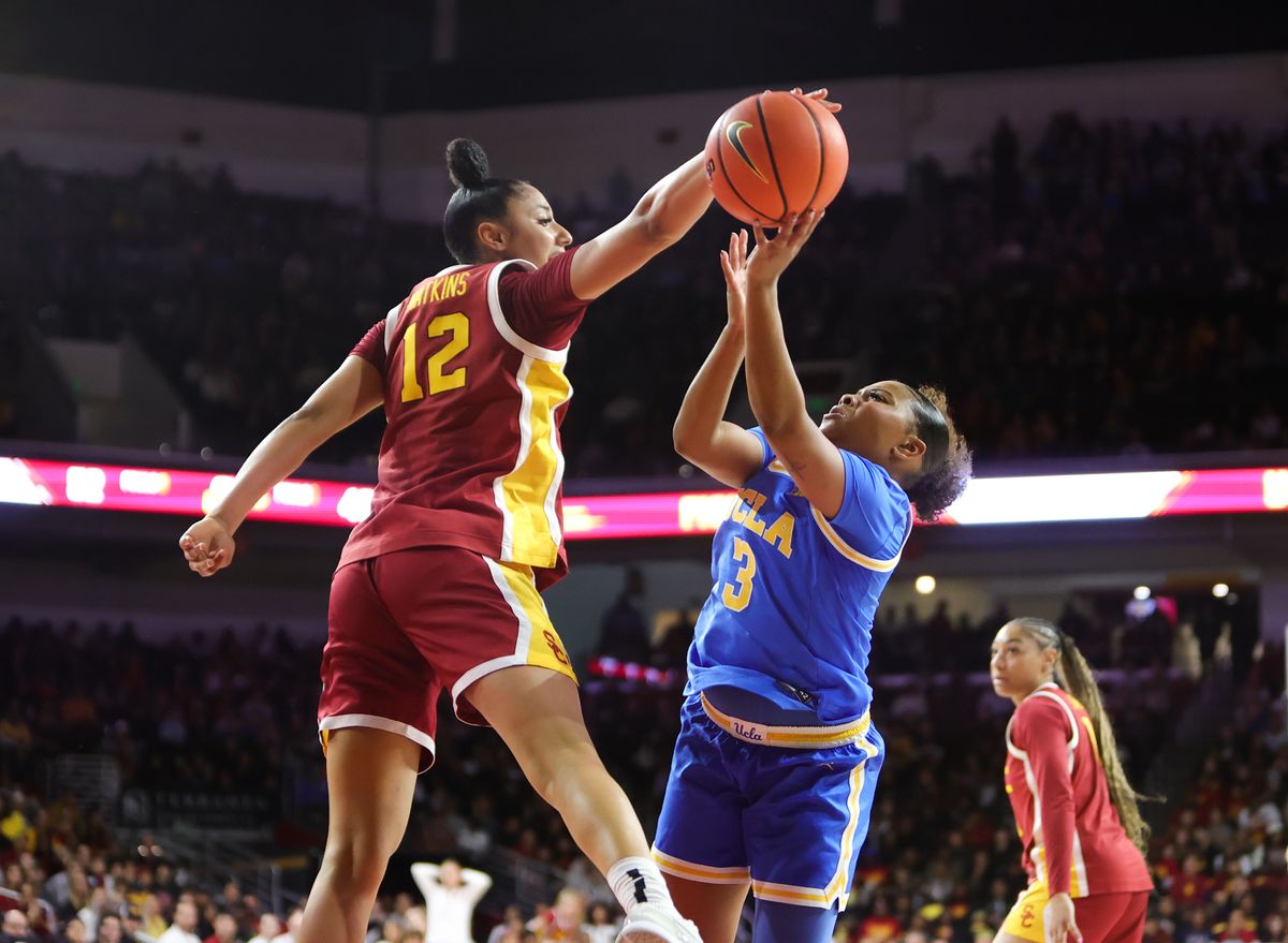 USC G (12) JuJu Watkins blocks the shot of UCLA G (3) Londynn Jones on February 13, 2025 at the Galen Center in Los Angeles, CA. USC G (12) JuJu Watkins blocks the shot of UCLA G (3) Londynn Jones on February 13, 2025 at the Galen Center in Los Angeles, CA.