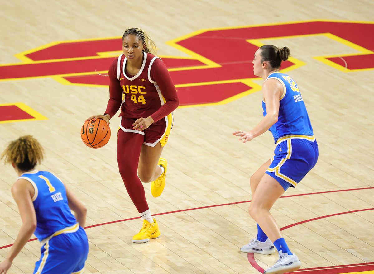 USC F (44) Kiki Irafen dribbles the basketball against UCLA on February 13, 2025 at the Galen Center in Los Angeles, CA. USC F (44) Kiki Irafen dribbles the basketball against UCLA on February 13, 2025 at the Galen Center in Los Angeles, CA.