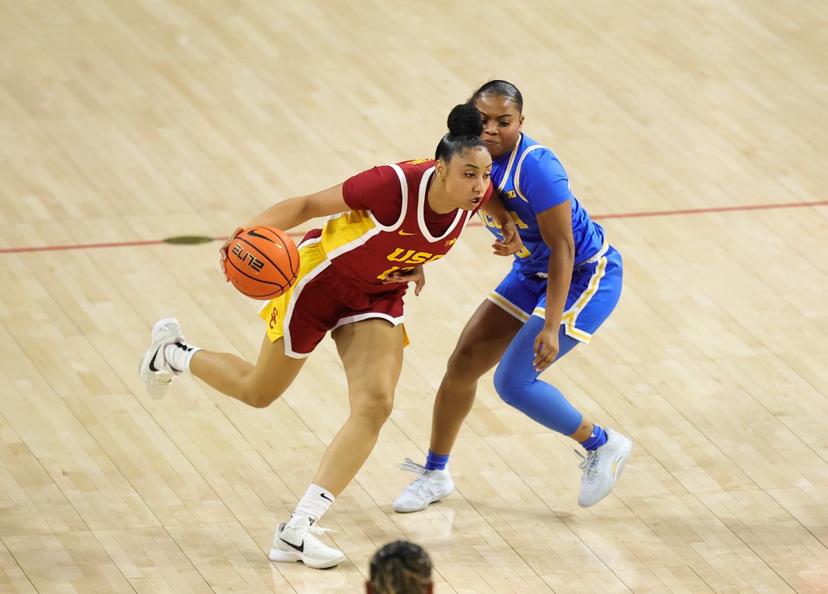 USC G (12) JuJu Watkins attempts to dribble past UCLA G (3) Londynn Jones on February 13, 2025 at the Galen Center in Los Angeles, CA. USC G (12) JuJu Watkins attempts to dribble past UCLA G (3) Londynn Jones on February 13, 2025 at the Galen Center in Los Angeles, CA.