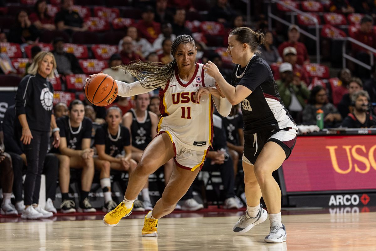 USC Guard Kennedy Smith (11) drives to the basket during a Big Ten basketball game against the New Mexico, Tuesday November 4, 2025 in Los Angeles, Calif.