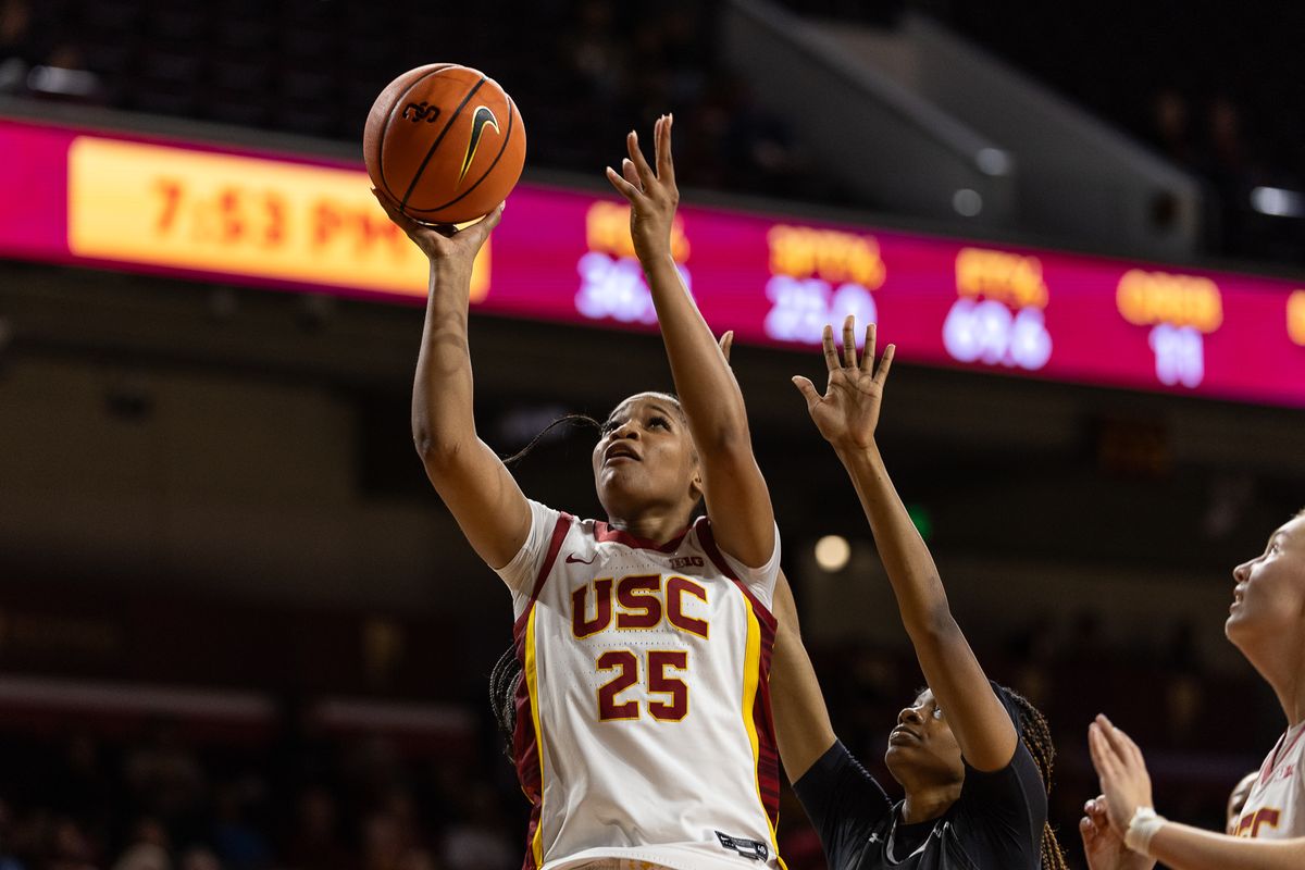 USC Guard Kara Dunn (25) shoots the ball during a Big Ten basketball game against the New Mexico, Tuesday November 4, 2025 in Los Angeles, Calif.