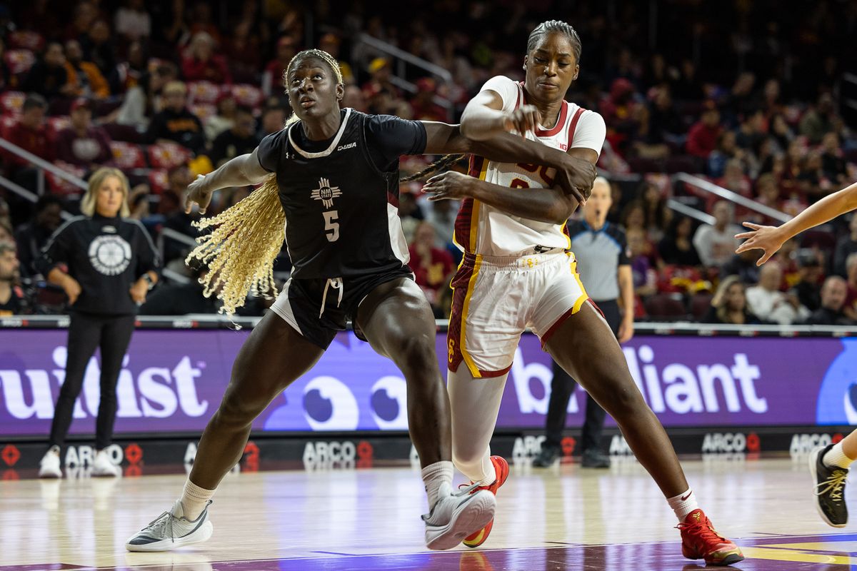 USC Forward Vivian Iwuchukwu (0) goes for the rebound during a Big Ten basketball game against the New Mexico, Tuesday November 4, 2025 in Los Angeles, Calif.