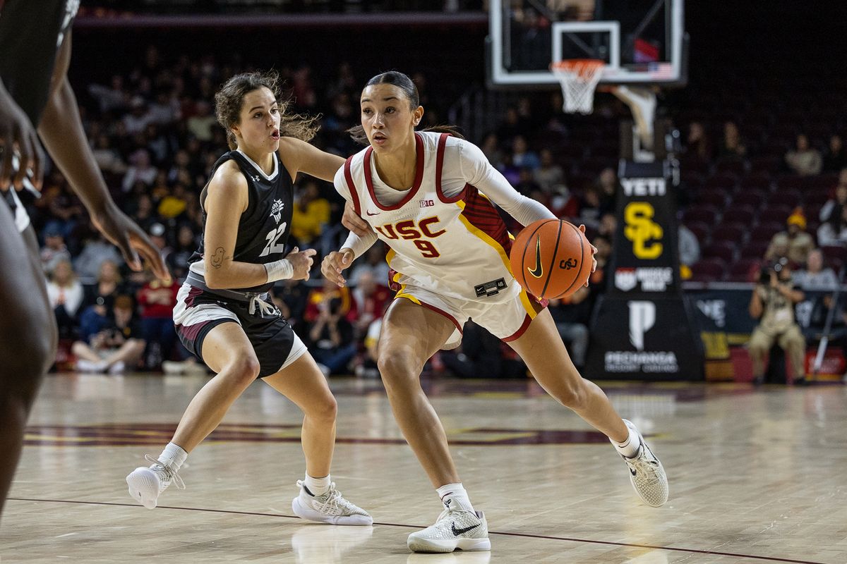USC Guard Jazzy Davidson (9) drives past the defense during a Big Ten basketball game against the New Mexico, Tuesday November 4, 2025 in Los Angeles, Calif.