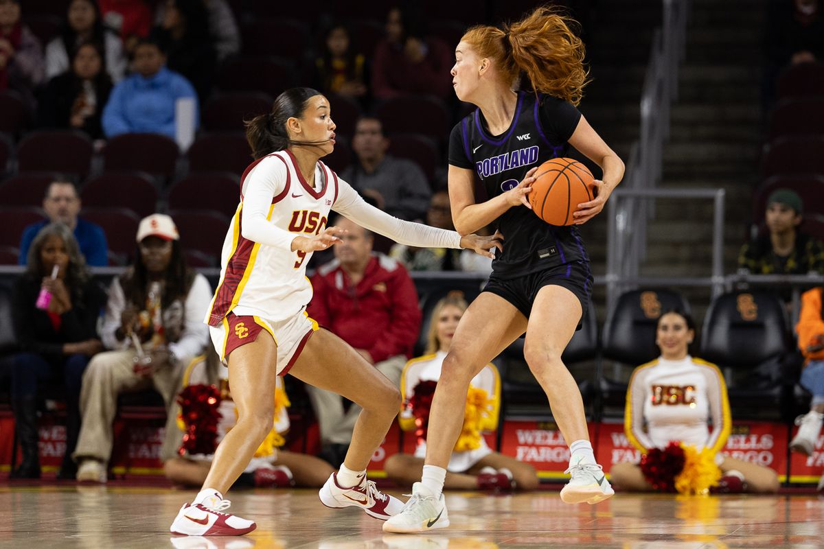 USC guard Jazzy Davidson (9) defends during a Big Ten college basketball game against the Portland Pilots, Tuesday November 18, 2025 in Los Angeles.