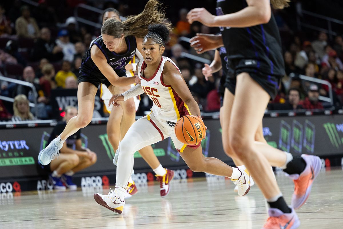 USC guard Malia Samuels (10) dribbles during a Big Ten college basketball game against the Portland Pilots, Tuesday November 18, 2025 in Los Angeles.