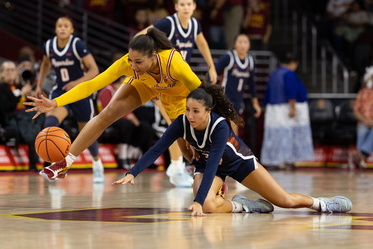 USC guard Kennedy Smith (11) steals the ball during a Big Ten college basketball game against the Pepperdine Waves, Friday November 28, 2025 in Los Angeles.