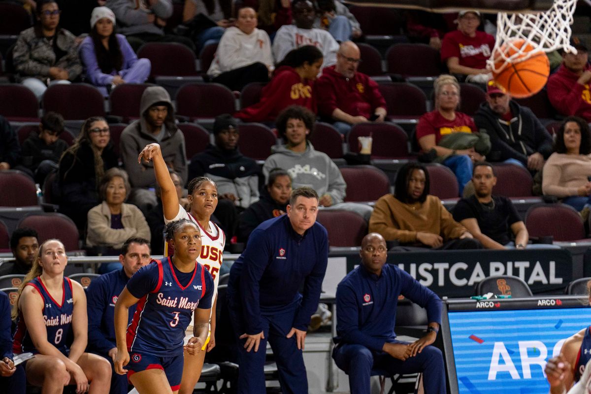 USC guard Kara Dunn (25) hits the corner three during an NCAA basketball game against St. Mary’s, Tuesday December 2nd, 2025 in Los Angeles, California. 