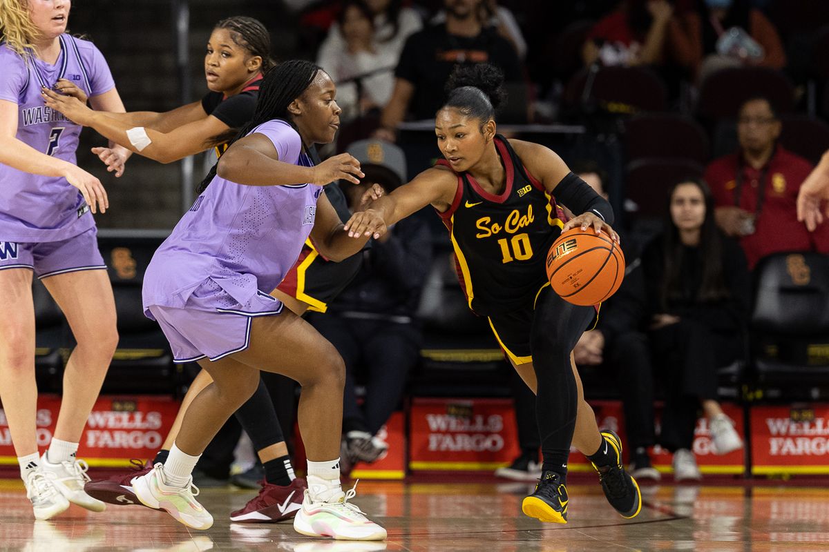USC guard Malia Samuels (10) dribbles during a Big Ten college basketball game against the Washington Huskies, Sunday December 7, 2025 in Los Angeles.