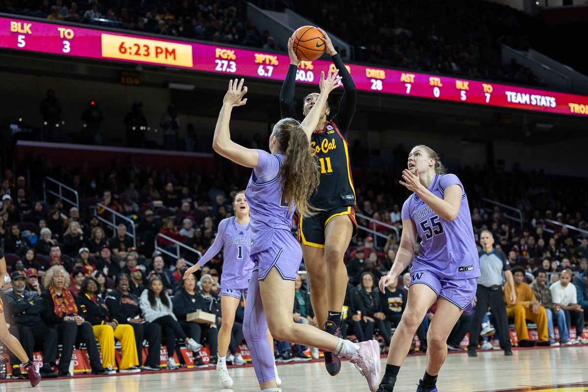USC guard Kennedy Smith (11) shoots during a Big Ten college basketball game against the Washington Huskies, Sunday December 7, 2025 in Los Angeles.