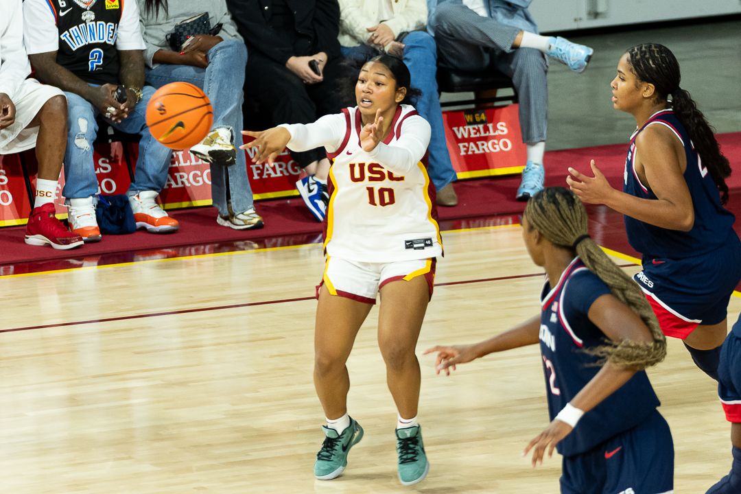 USC guard Malia Samuels (10) passes the ball during a Big 10 basketball game against the University of Connecticut, Saturday, December 13th, 2025 in Los Angeles, California