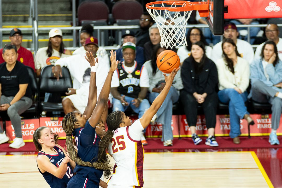 USC guard Kara Dunn (25) takes a lay-up during a Big 10 basketball game against the University of Connecticut, Saturday, December 13th, 2025 in Los Angeles, California