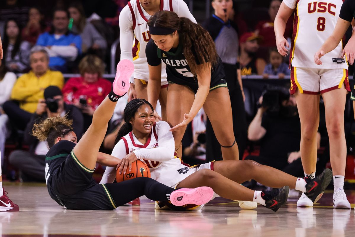 USC Trojans guard Malia Samuels (10) battles for the ball during the women's college basketball game against the Cal Poly Mustangs, Thursday December 18th, 2025 at Galen Center in Los Angeles, Calif.