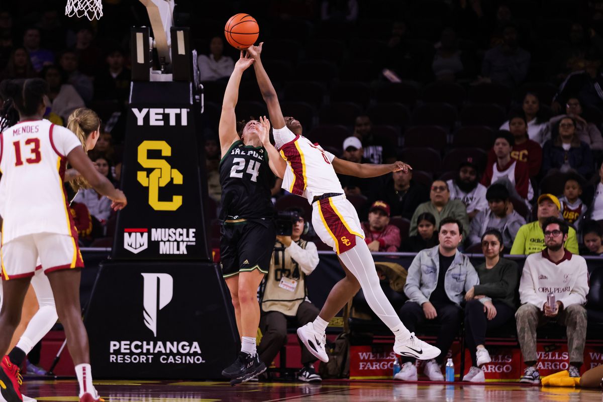 USC Trojans Forward Vivian Iwuchukwu (0) blocks during the women's college basketball game against the Cal Poly Mustangs, Thursday December 18th, 2025 at Galen Center in Los Angeles, Calif.