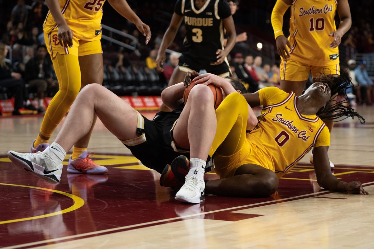 USC Trojans Forward Vivian Iwuchukwu (0) gets landed on during a scramble for the ball during a women's college basketball game against the Purdue Boilermakers, Sunday January 18th, 2026 at Galen Center in Los Angeles, Calif.