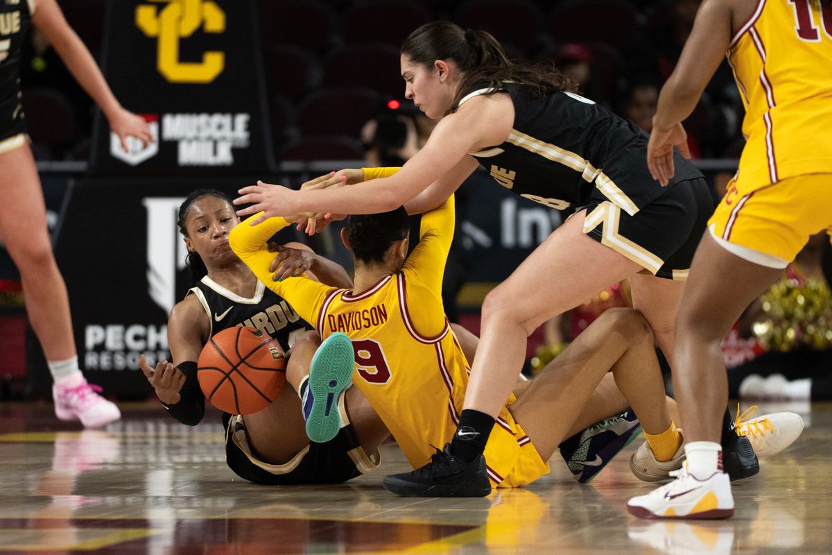 USC Trojans Guard Jazzy Davidson (9) scrambles on the ground for a loose ball during a women's college basketball game against the Purdue Boilermakers, Sunday January 18th, 2026 at Galen Center in Los Angeles, Calif.