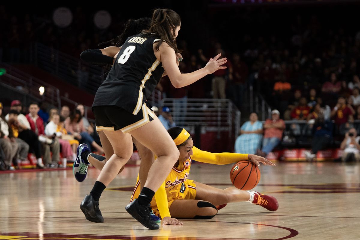 USC Trojans Guard Kennedy Smith (11) gets knocked to the ground during a women's college basketball game against the Purdue Boilermakers, Sunday January 18th, 2026 at Galen Center in Los Angeles, Calif.
