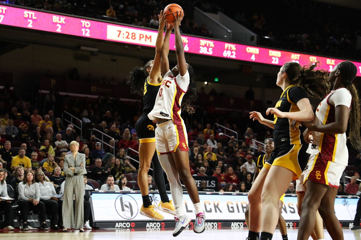 USC forward Vivian Iwuchukwu (0) battles for the loose rebound during an NCAA basketball game against the Iowa Hawkeyes on January 29, 2026 in Los Angeles, CA.