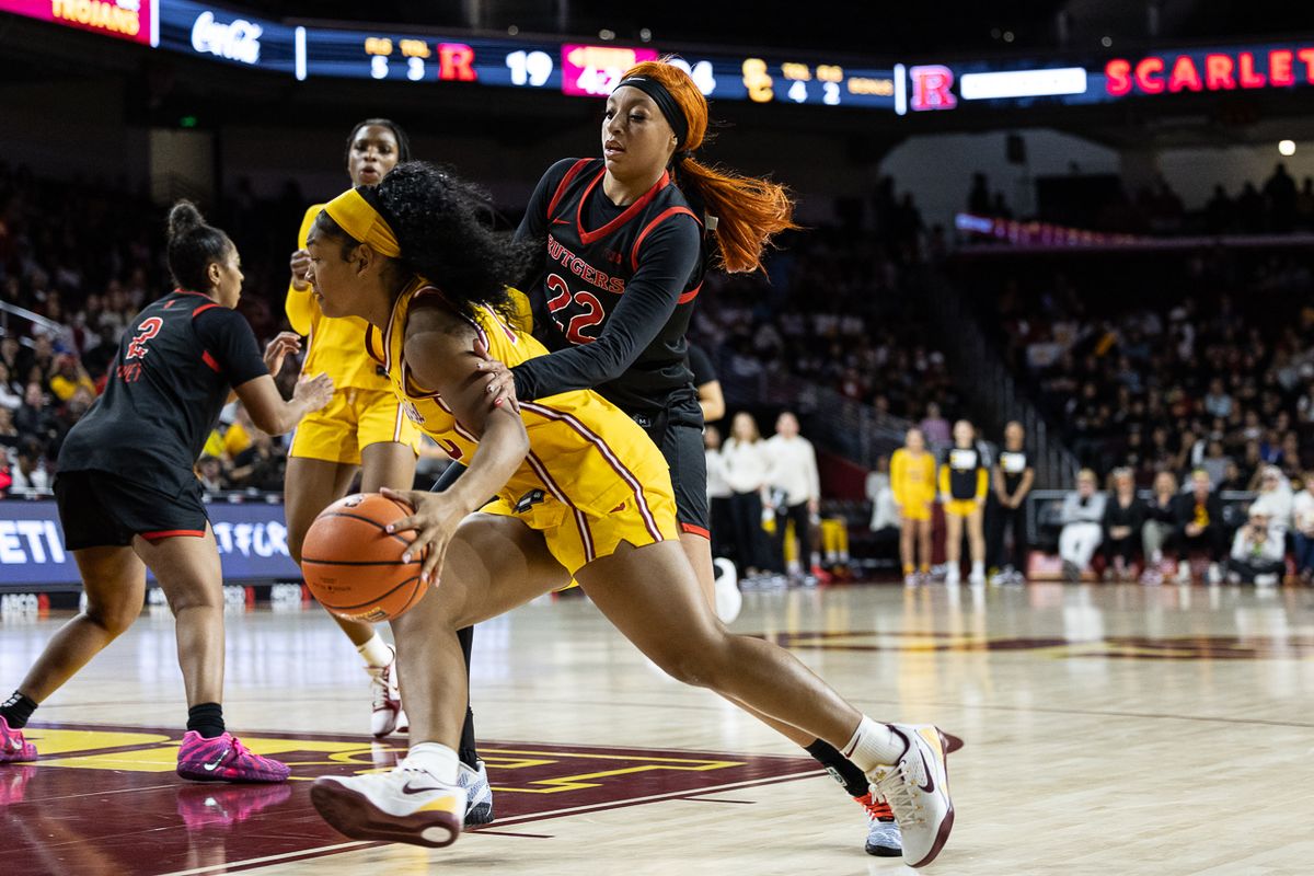 USC guard Malia Samuels (10) dribbles past defense during a Big Ten college basketball game against the Rutgers Scarlet Knights, Sunday February 1, 2026  in Los Angeles.