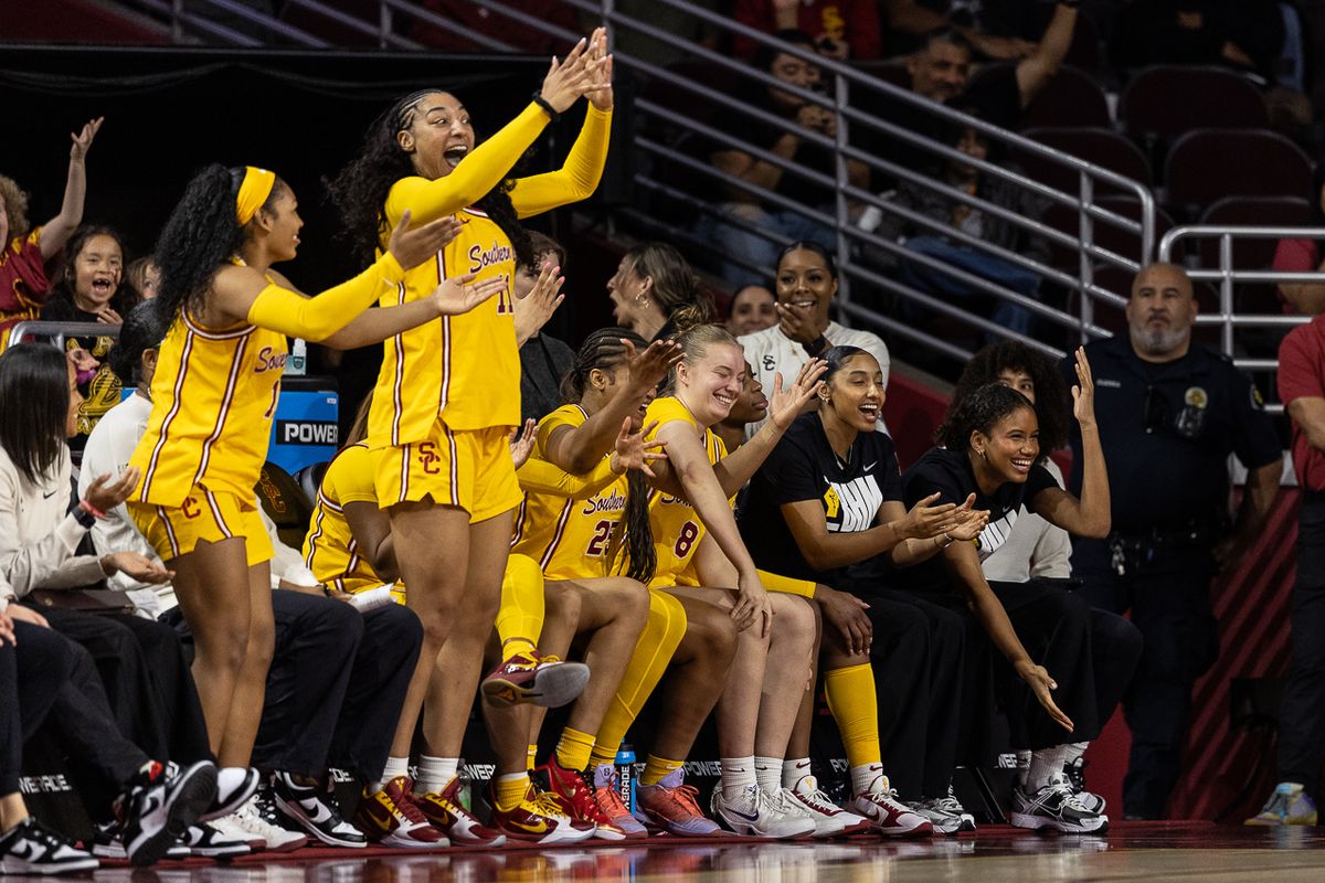 USC players celebrate the score during a Big Ten college basketball game against the Rutgers Scarlet Knights, Sunday February 1, 2026  in Los Angeles.