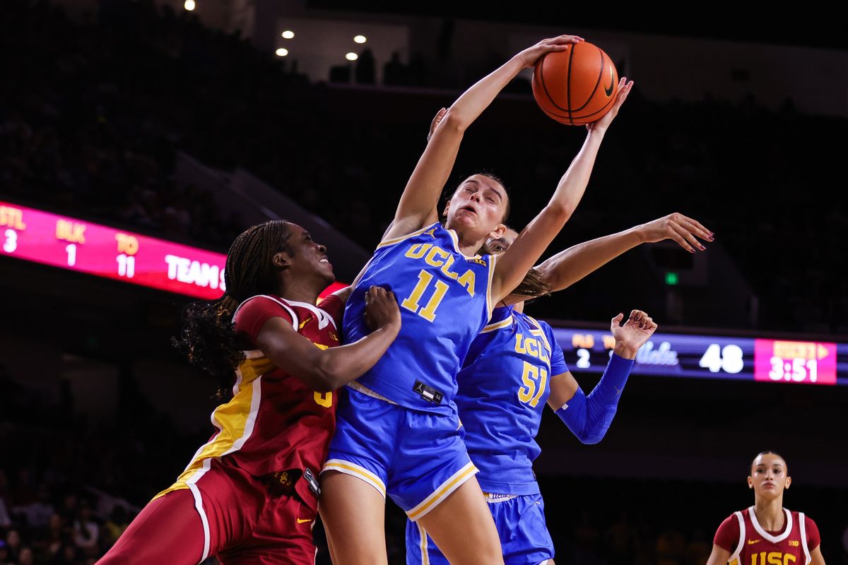 USC Trojans guard Gabriela Jaquez (11) reaches for the ball during the women's college basketball game against the UCLA Bruins, Sunday March 1st, 2026 at Galen Center in Los Angeles, Calif.