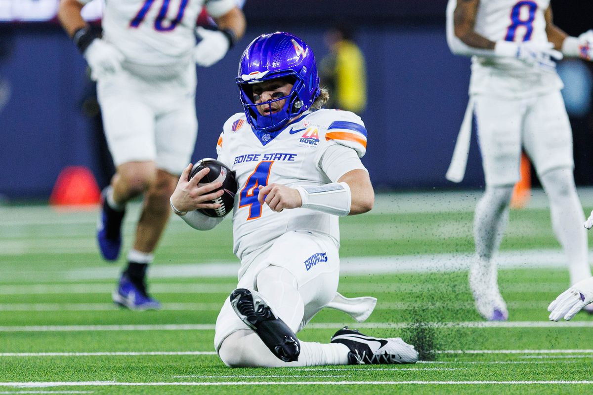 Boise State Broncos quarterback Maddux Madsen (4) slides during the LA Bowl against the Washington Huskies on December 13, 2025 in Los Angeles, California.