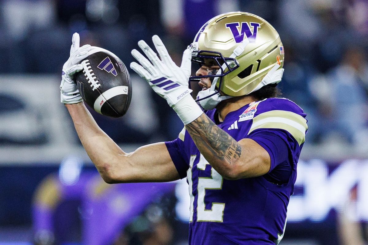 Washington Huskies wide receiver Denzel Boston (12) celebrates while running in for a touchdown during the LA Bowl against the Boise State Broncos on December 13, 2025 in Los Angeles, California.
