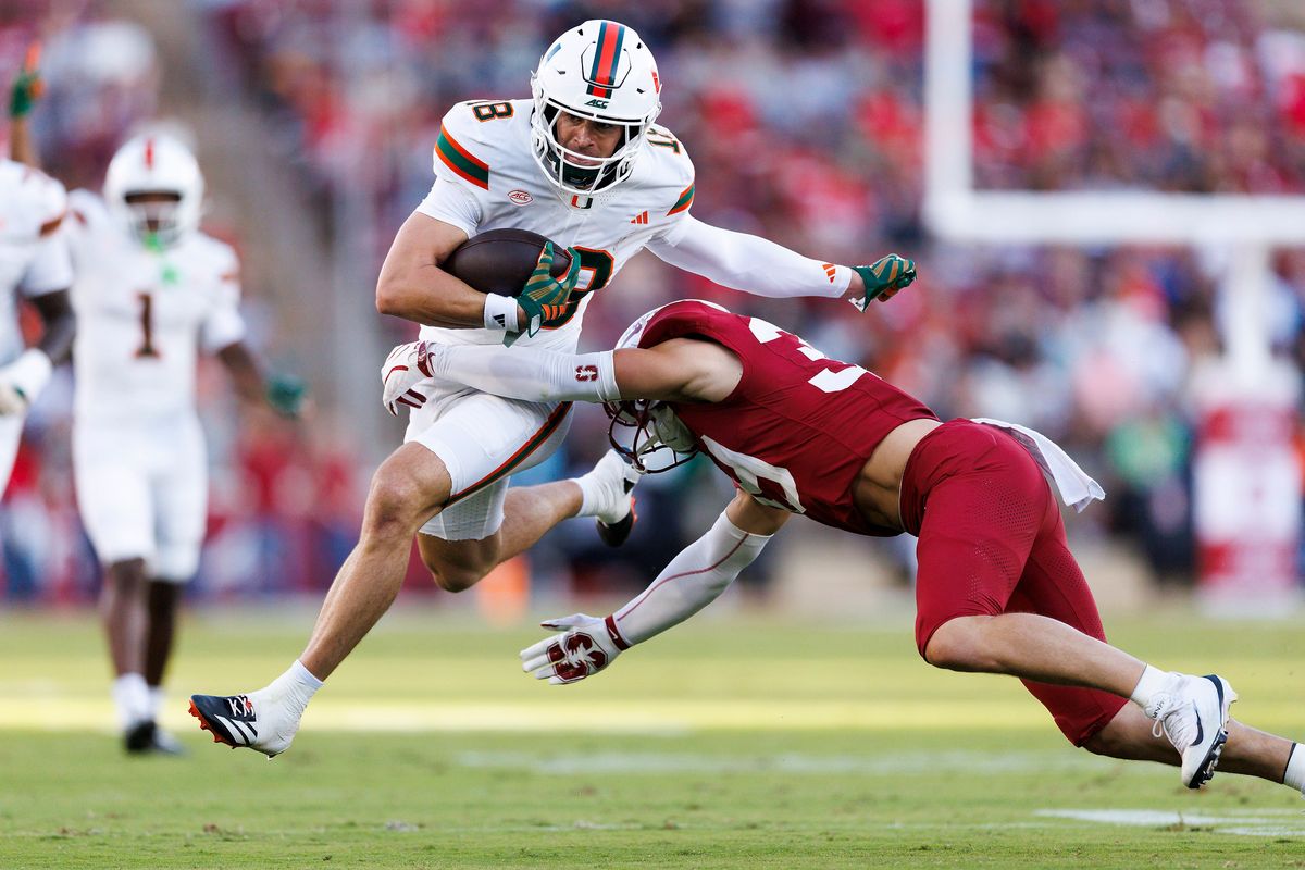 Cooper Barkate #18 of the Miami Hurricanes runs after the catch during the game against Stanford Cardinal at Stanford Stadium on September 4, 2026 in Stanford, California. 