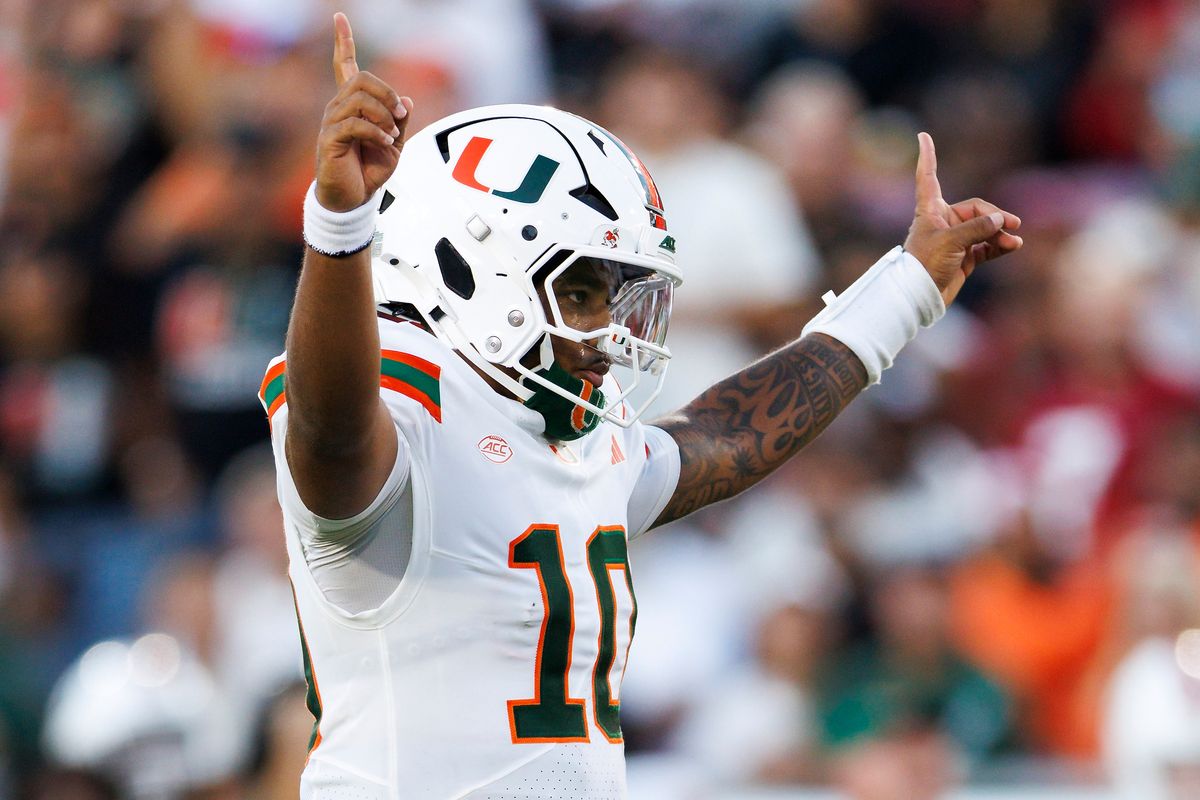 Darian Mensah #10 of the Miami Hurricanes celebrates a touchdown during the game against Stanford Cardinal at Stanford Stadium on September 4, 2026 in Stanford, California. 