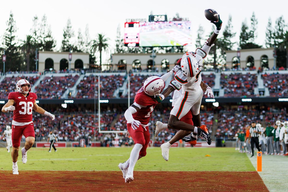 Joshua Moore #3 of the Miami Hurricanes jumps for the ball during the game against Stanford Cardinal at Stanford Stadium on September 4, 2026 in Stanford, California. Joshua Moore #3 of the Miami Hurricanes jumps for the ball during the game against Stanford Cardinal at Stanford Stadium on September 4, 2026 in Stanford, California.