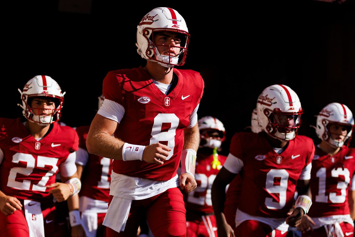 Davis Warren #8 of the Stanford Cardinal runs onto the field before the game against Miami Hurricanes at Stanford Stadium on September 4, 2026 in Stanford, California. 