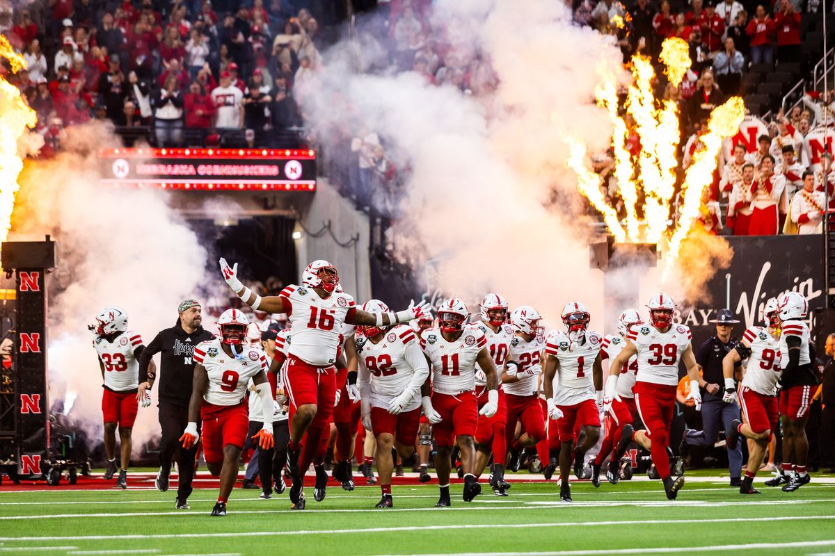Nebraska Huskers run onto the field before the SRS Distribution Las Vegas Bowl game between the Nebraska Huskers and the Utah Utes, Sunday December 31, 2025 in Las Vegas, Nev.