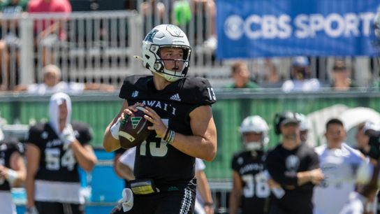 Hawaii quarterback Brayden Schager looks for an open receiver in Hawai'i's game against UCLA on Saturday, August 31, 2024.