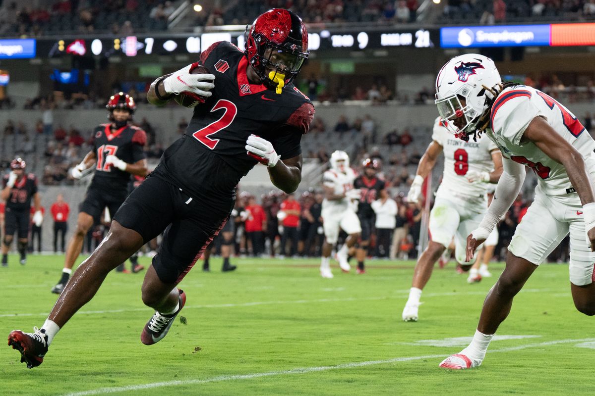 San Diego State University wide receiver Jordan Napier (2) runs up the field during an NCAA football game against Stony Brook University, Thursday August 28, 2025 in San Diego, California.