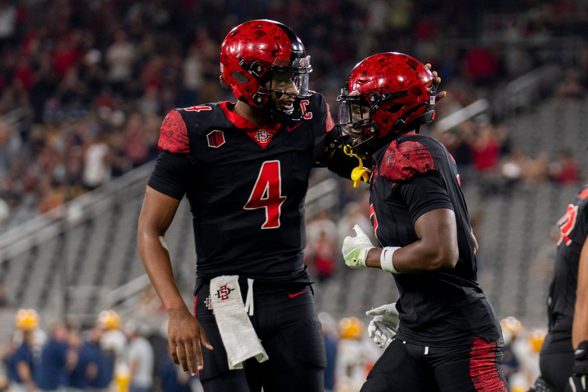 San Diego State Aztecs QB Jayden Denegal (4) and WR Jordan Napier (2) celebrate the touchdown stop during an NCAA football game against the California Golden Bears, Saturday September 20th, 2025 in San Diego, California. San Diego State Aztecs QB Jayden Denegal (4) and WR Jordan Napier (2) celebrate the touchdown stop during an NCAA football game against the California Golden Bears, Saturday September 20th, 2025 in San Diego, California.