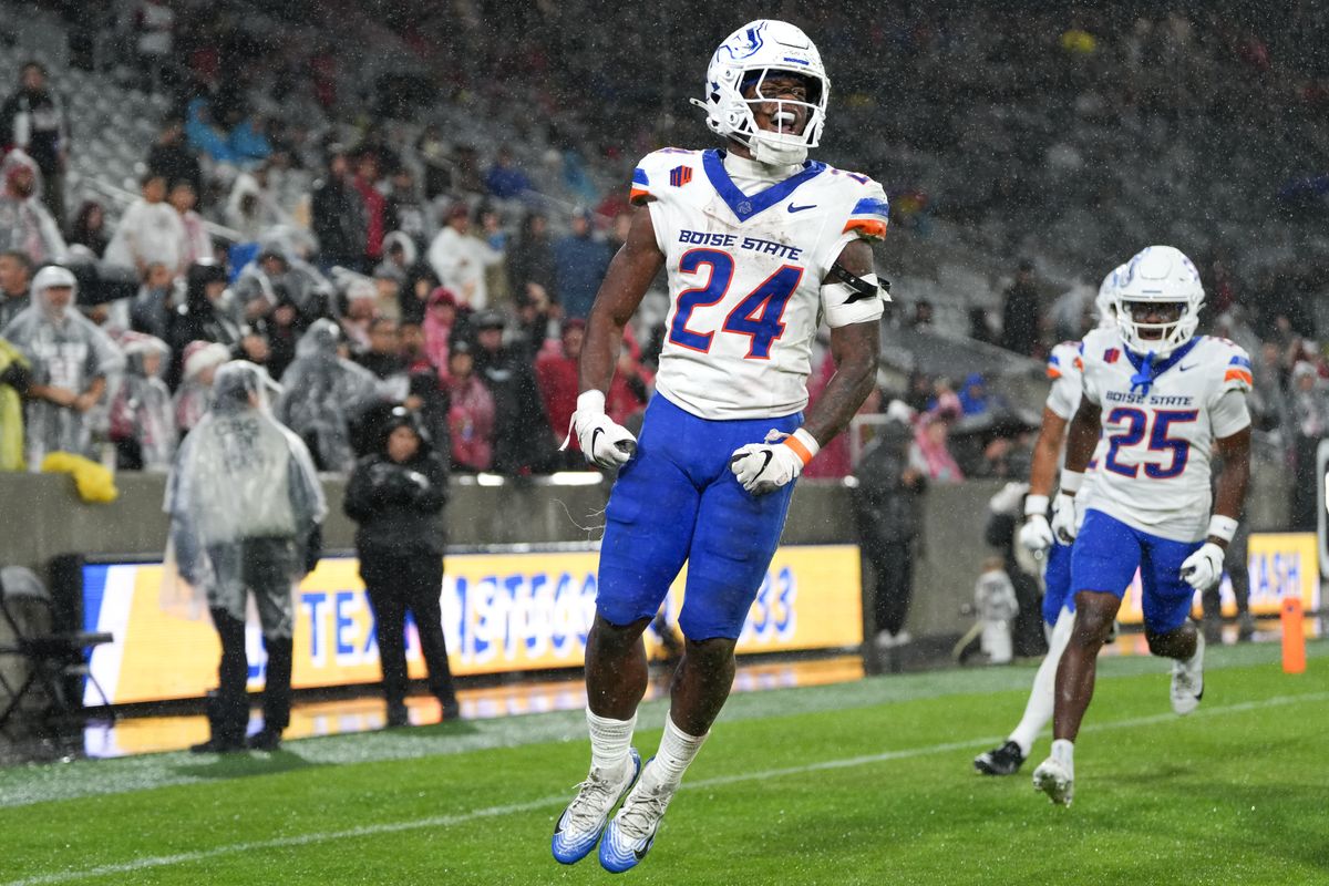 Boise State running back Dylan Riley (24) celebrates after scoring a touchdown during an NCAA football game against SDSU, Saturday November 15, 2025 in San Diego, California.