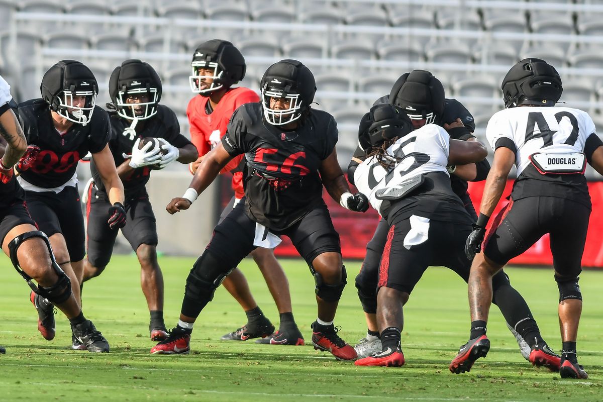 SDSU Offensive lineman Isaac Lucas (56) participates in the First scrimmage at Snapdragon Stadium on Saturday August 15, 2026 in San Diego, Calif.. SDSU Offensive lineman Isaac Lucas (56) participates in the First scrimmage at Snapdragon Stadium on Saturday August 15, 2026 in San Diego, Calif..
