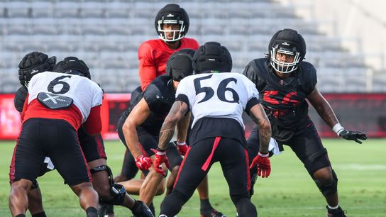 SDSU linebacker Sione Hala (56), SDSU center Isaac Lucas (56) participates in the First scrimmage at Snapdragon Stadium on Saturday August 15, 2026 in San Diego, Calif..