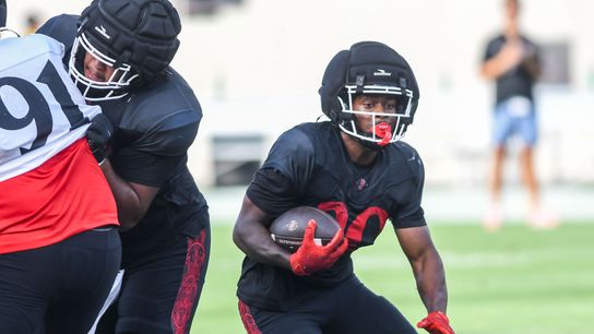 SDSU running back Christian Washington (20)  participates in the First scrimmage   at Snapdragon Stadium on  Saturday August 15, 2026 in  San Diego, Calif..