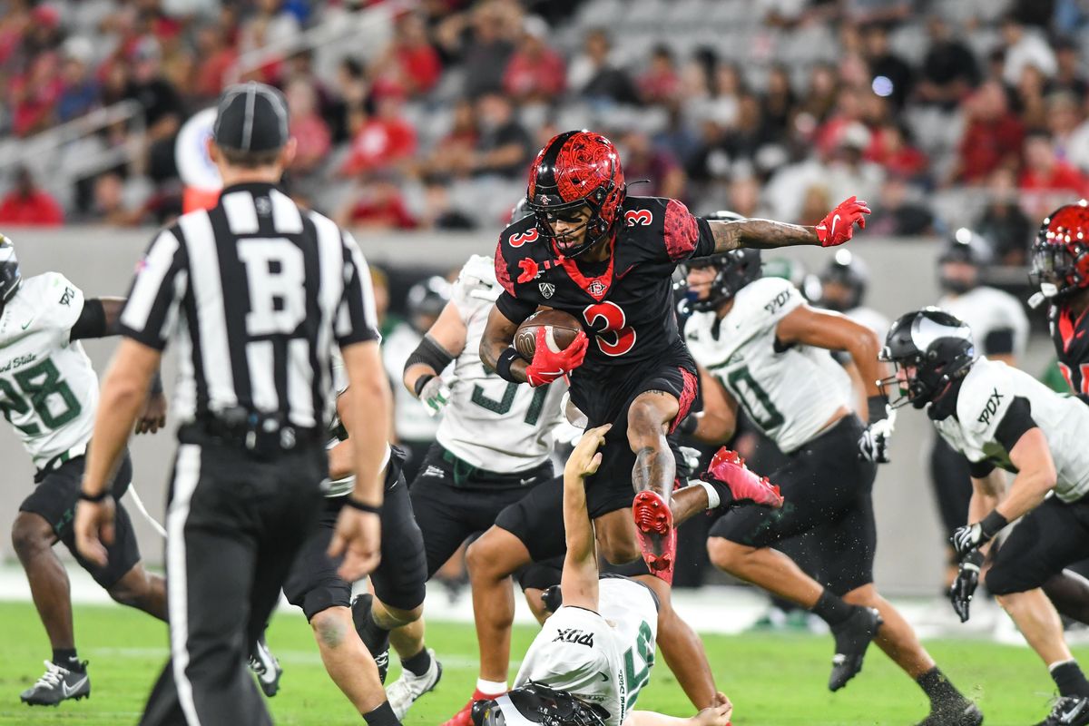 SDSU  wide receiver Nathan Acevedo hurdles the defender on a kickoff return during an NCAA football  game against Portland State Saturday September 5, 2026 in  San Diego, Calif.