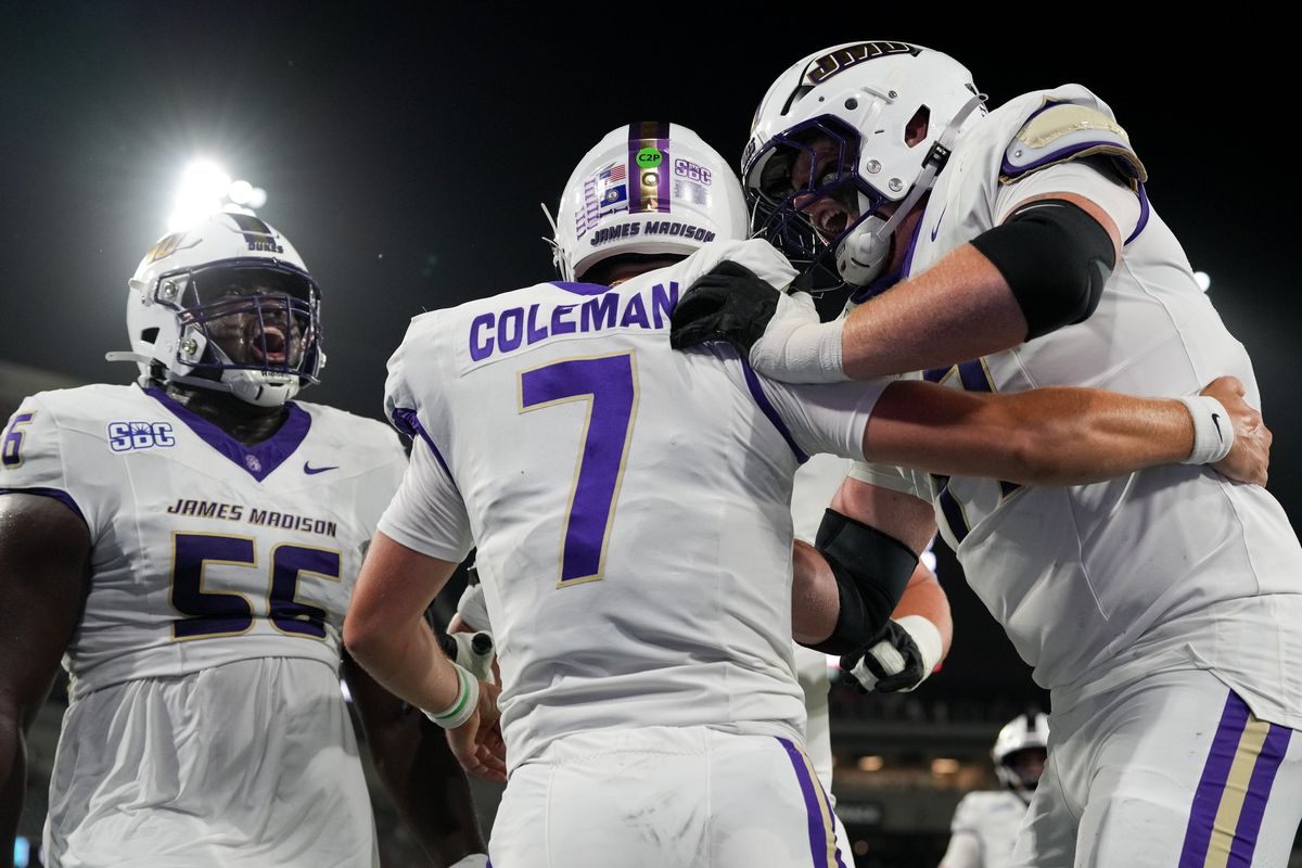 James Madison University quarterback Camden Coleman (7) celebrates with teammates after scoring a touchdown during an NCAA football game against San Diego State University, Saturday September 19, 2026 in San Diego, California.