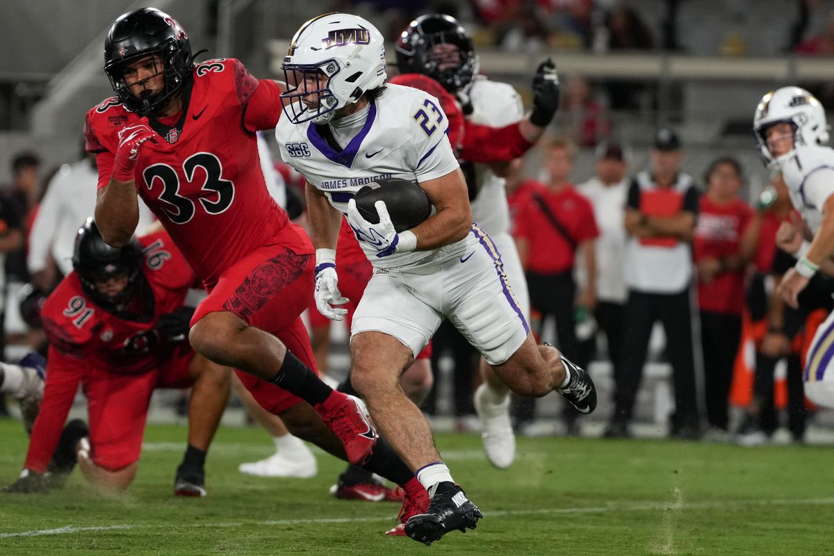 James Madison University running back Nick Herman (23) runs up the field during an NCAA football game against San Diego State University, Saturday September 19, 2026 in San Diego, California.